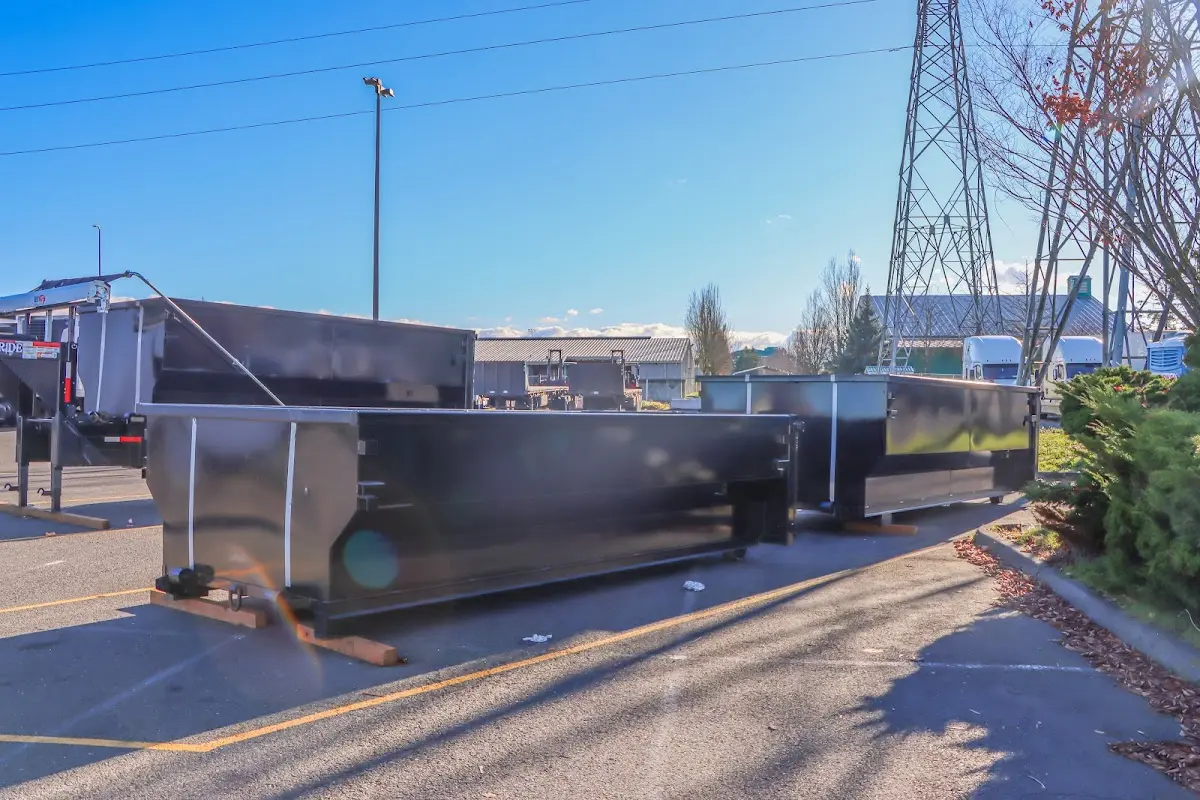 Roll-off dumpster ready for waste disposal at job site for 15 Yard Dumpster Rental in Union Gap